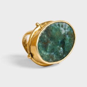 This pick is inspired by Laura Dern’s enormous Bulgari turquoise ring. We love how the chunky shape complements the dynamic green agate stone set in bronze. Wear it with a simple tank and slit skirt to play up its striking aesthetic.  