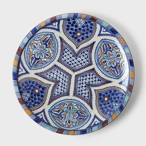 Cate Blanchett’s ice blue collar necklace was a beautiful example of statement-making detail. Accessorize your home in a similar fashion with this stunning Blue Stars Moroccan Plate. As a decorative wall hanging or table centerpiece, it adds a subtle pop of sophisticated color and pattern to any interior. 